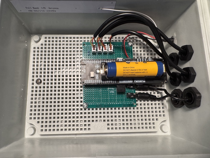 The board assembled in its waterproof project case